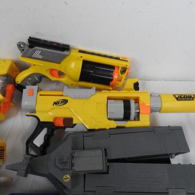 7 Nerf Guns, 1 Blue Large Bucket, Nerf Slingshot, Nerf Bow, Bullets not included