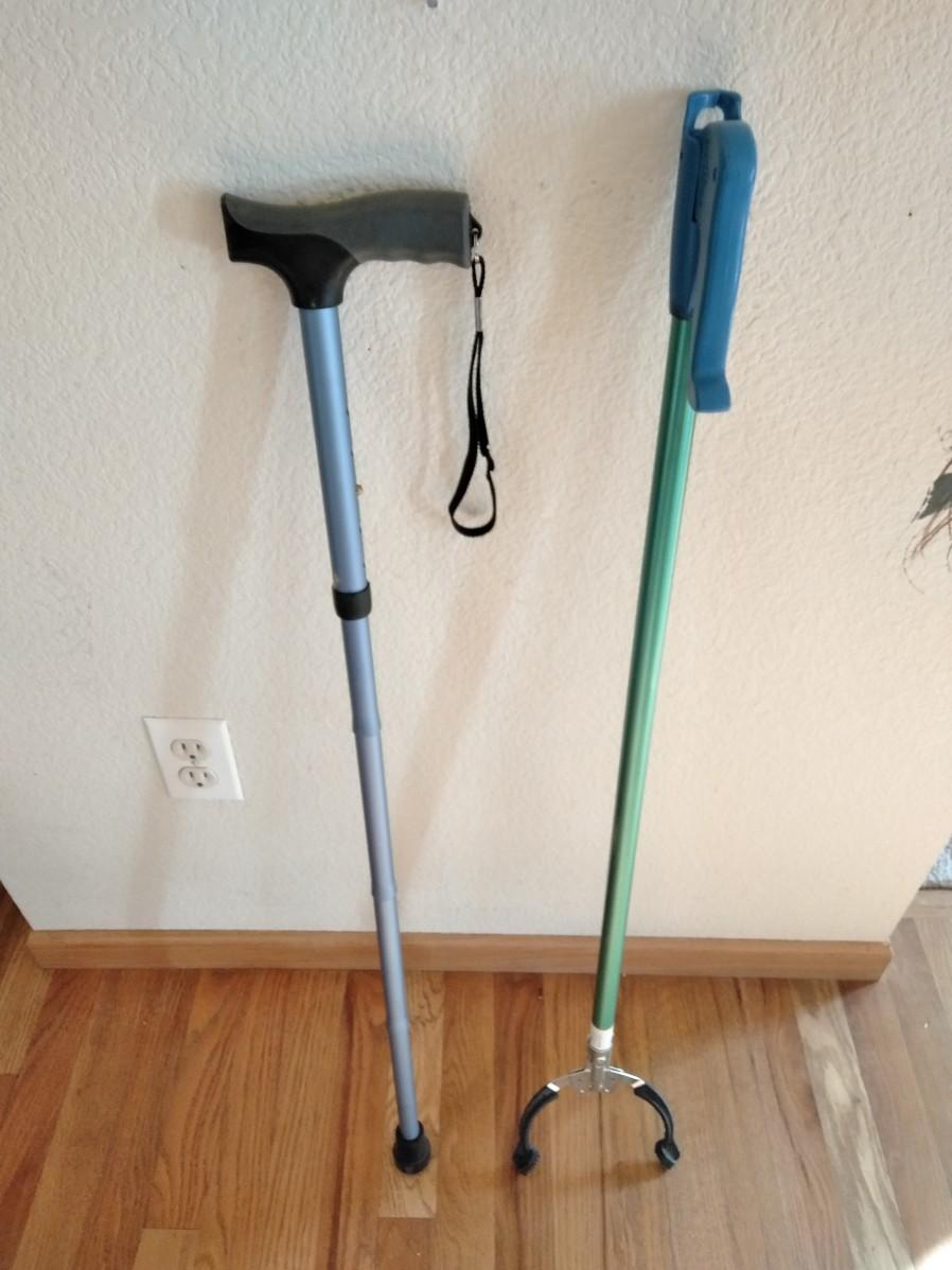 LOT 240 ADJUSTABLE WALKING CANE AND GRABBER TOOL