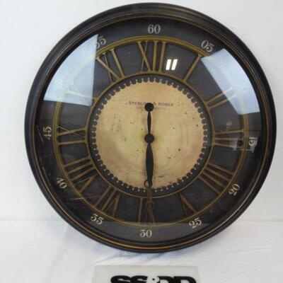Large Wall Clock by Sterling & Noble. Glass cracked. Works