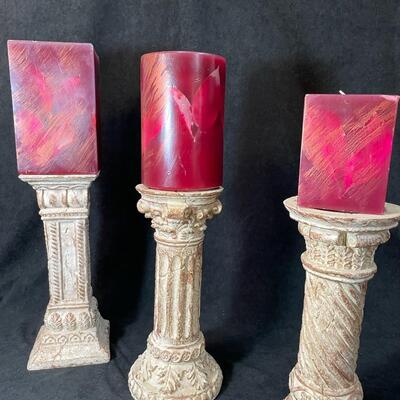 Lot 98  Three Cream Pillar Candle Stands