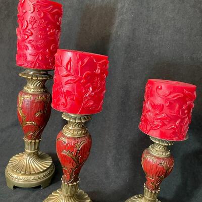 Lot 99  Three Pillar Candle Holders w/ Candles