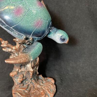 Lot 102  Aqua Turtle Figurine and Candle Vase