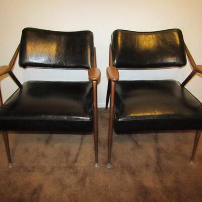 LOT 2  MID-CENTURY MODERN VINYL ARM CHAIRS