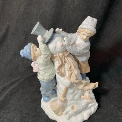 Lot 131  Two Porcelain Figurines