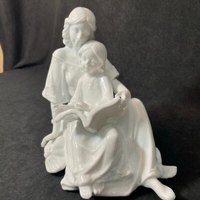 Lot 135  Porcelain Mother Reading to Daughter