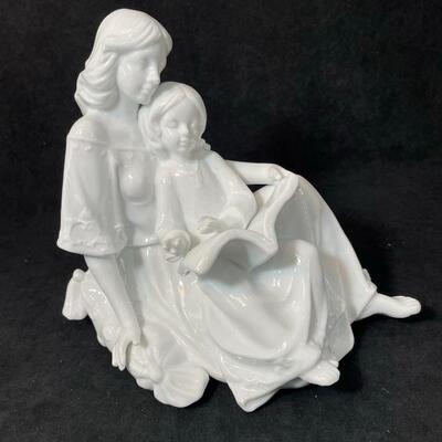 Lot 135  Porcelain Mother Reading to Daughter