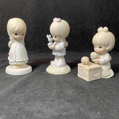 Lot 137  Three Precious Moments Figurines