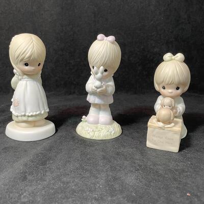Lot 137  Three Precious Moments Figurines