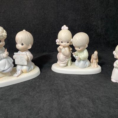 Lot 139  Three Precious Moments Figurines