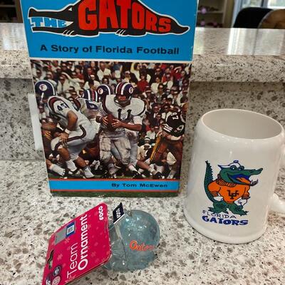 Lot 158  Florida Gators Lot w/ Autographed Book