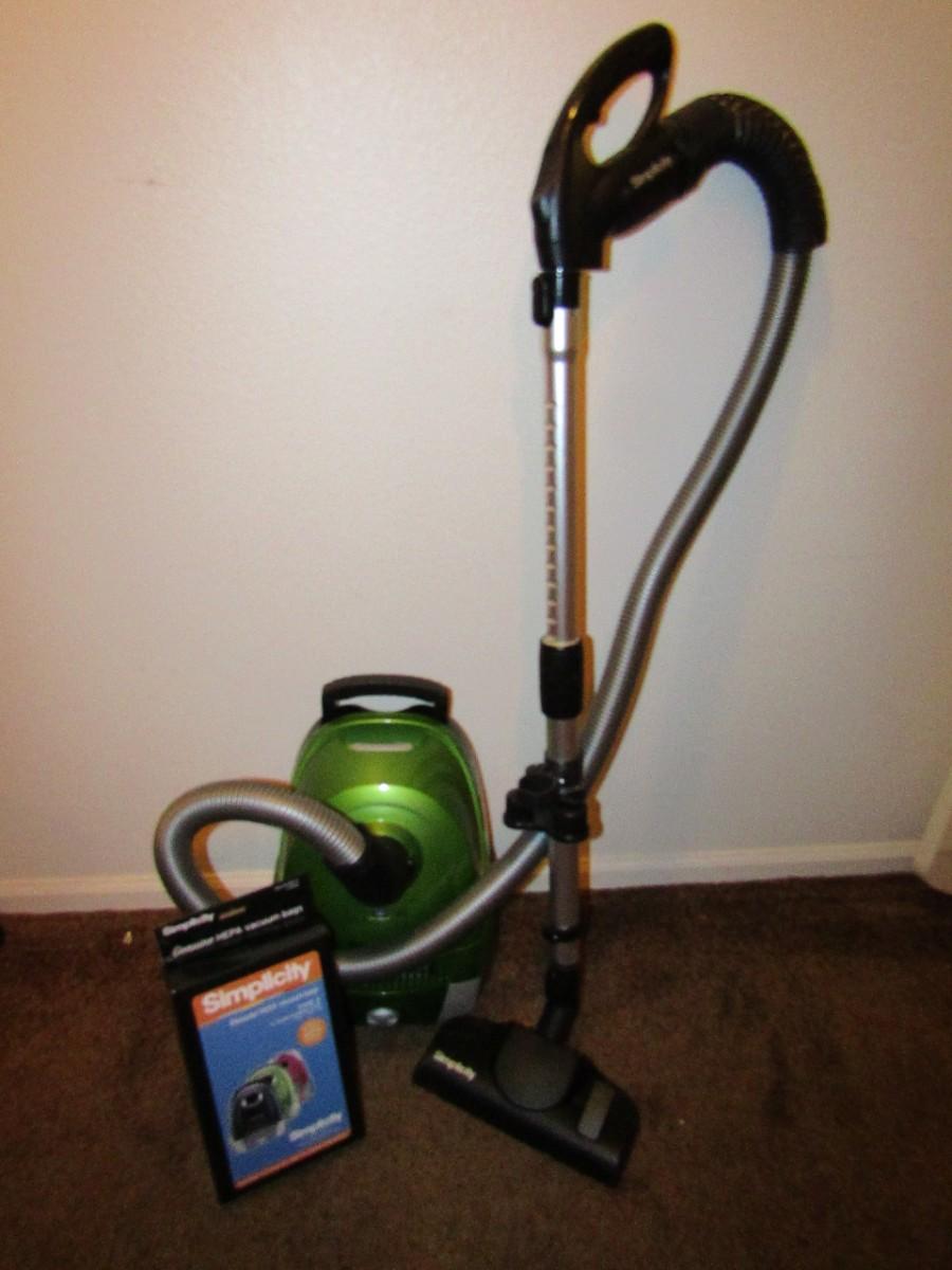 LOT 20 SIMPLICITY CANISTER VACUUM | EstateSales.org