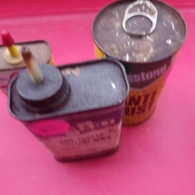3 lubricant tins