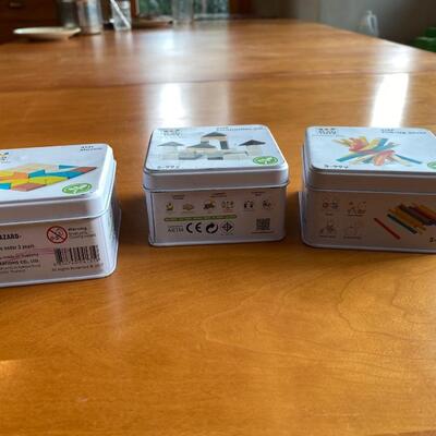 Set of three (3) portable wooden toy games in tin boxes