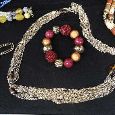 Costume Jewelry:  5 Bracelets, 6 Necklaces Assorted Colors