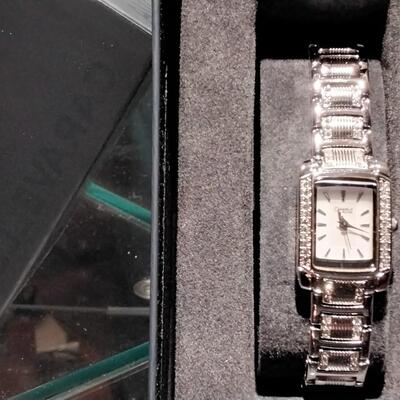 Caravelle by Bulova Women's Rectangular Clear Crystal Analog Petite Watch 43L010