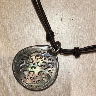 Necklace with leather and abalone shell pendant