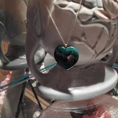 Gorgeous Malachite Heart with 14k rabbit ear bale on 18