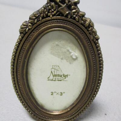 Two Nantucket Metal Oval Picture Frames & 1 With Portrait