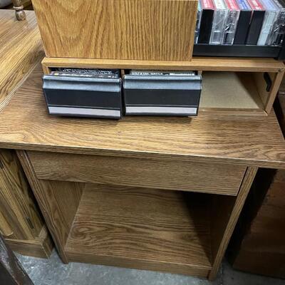Small side table with cassettes and cases