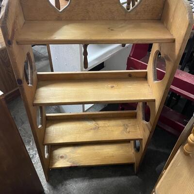 Wooden shelving with heart decor