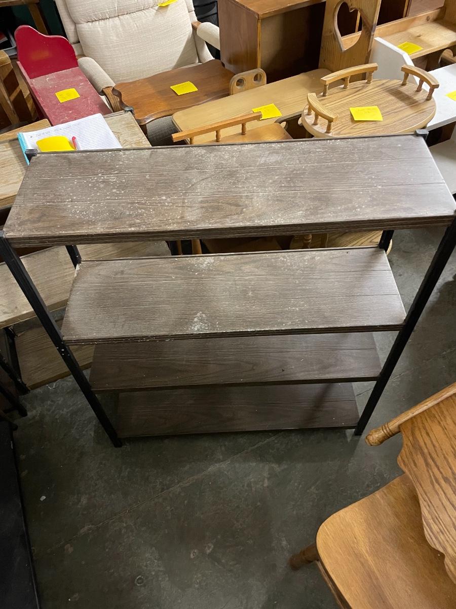 Brown and black metal shelving