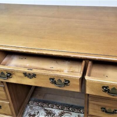 Lot #63  Wooden Kneehole Desk with Oak Finish