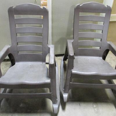 Pair Of Outdoor Molded Composite Slat Back Rocking Chairs