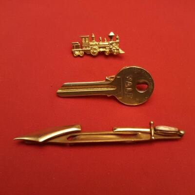 Unique Tie Clasps and a Train Pin