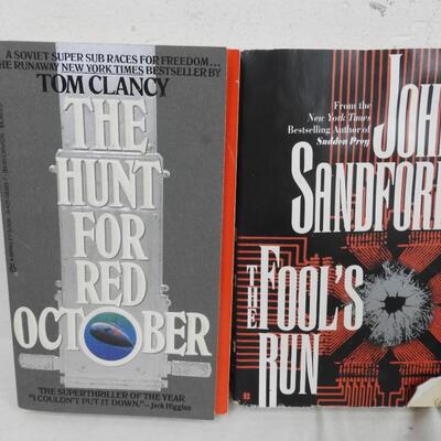 7 Paperback Mystery/Action Books: Tom Clancy, Clive Cussler, John Sandford