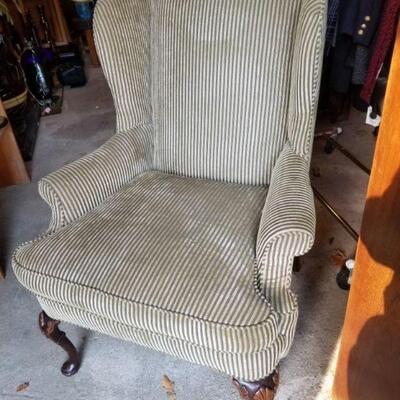 Large wing club chair with subtle stripe pattern
