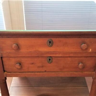 Lot #86  Antique 2 drawer side table = glass top