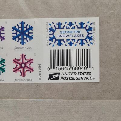 Lot 39: Holiday Forever Stamps (Charlie Brown, Magi, and Geometric Snowflakes) $34.80