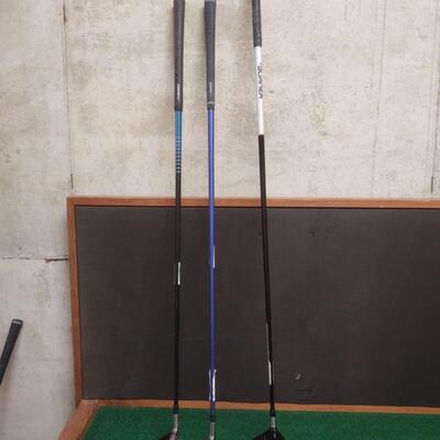 Three Golf Clubs