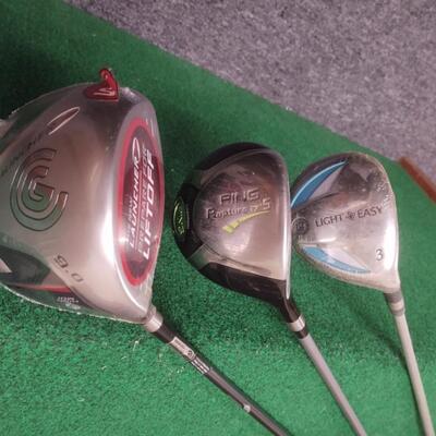 Three Golf Clubs