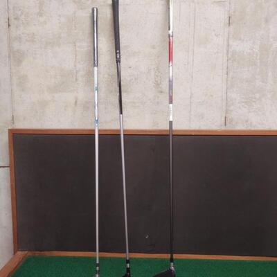 Three Golf Clubs