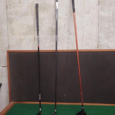 Three Golf Clubs