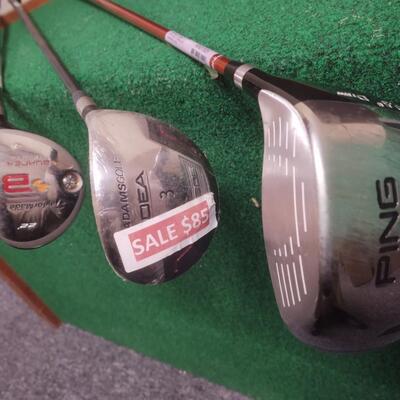 Three Golf Clubs