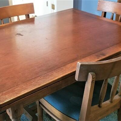 Lot #106  Vintage Oak Dining Room Table and Six Chairs