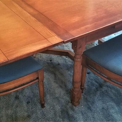 Lot #106  Vintage Oak Dining Room Table and Six Chairs