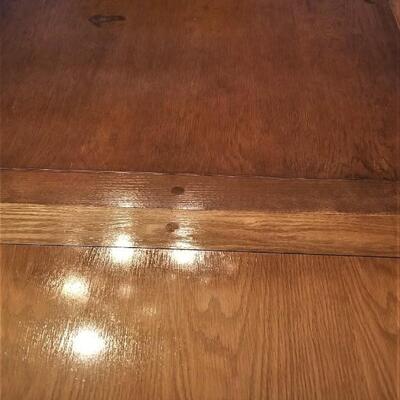 Lot #106  Vintage Oak Dining Room Table and Six Chairs