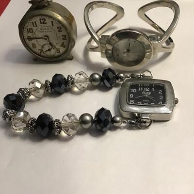 Lot 11 Wristwatches & Mini Alarm Clock