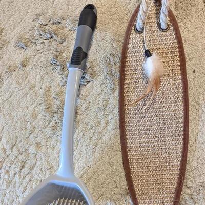 #23 cat scooper, and cat scratcher 