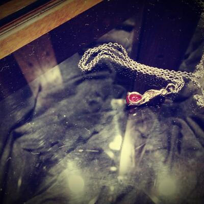 Mozambique Ruby with white Sapphire accents set in sterling silver 18