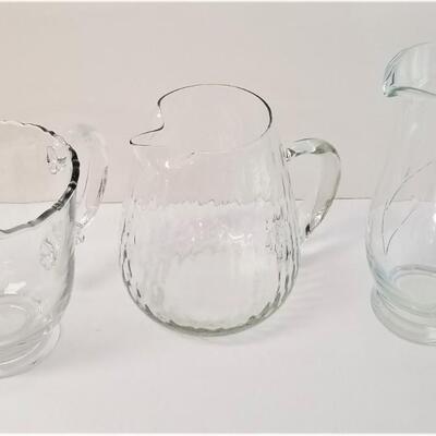 Lot #148  Lot of Three Glass/Crystal Pitchers