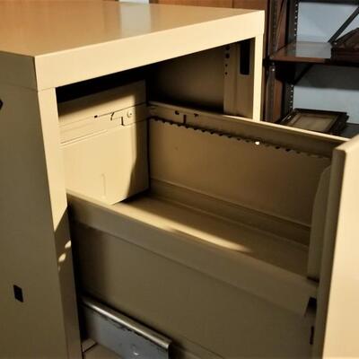 Lot #151  4 Drawer File Cabinet