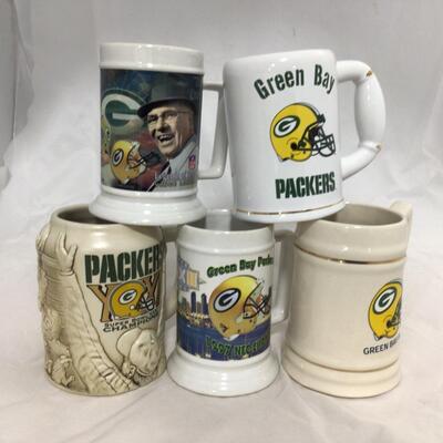 (4) PACKERS | Mixed group of Steins