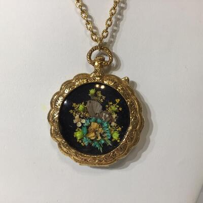 Vintage gold tone necklace with locket dried flowers