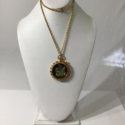 Vintage gold tone necklace with locket dried flowers