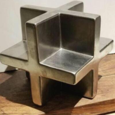 Small mid-century architectural-style metal sculpture with interlocking squares