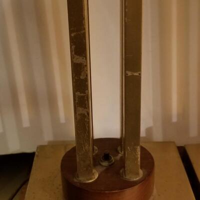 They are of mid-century modern tall metal lamps
